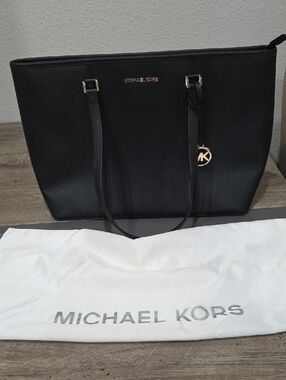 Michael Kors Black Tote with Gold MK Pendant